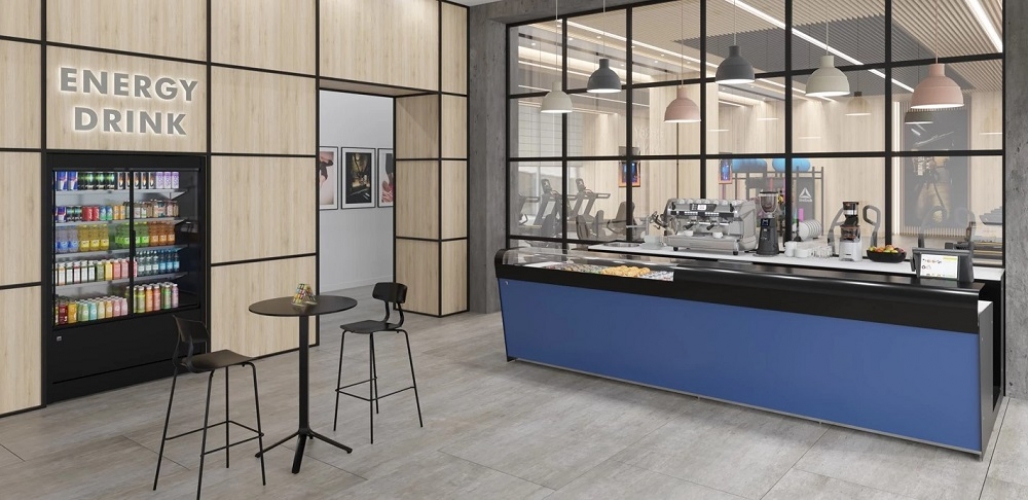 A practical, space-saving, complete bar space has been created for the gym by revamping a transit area