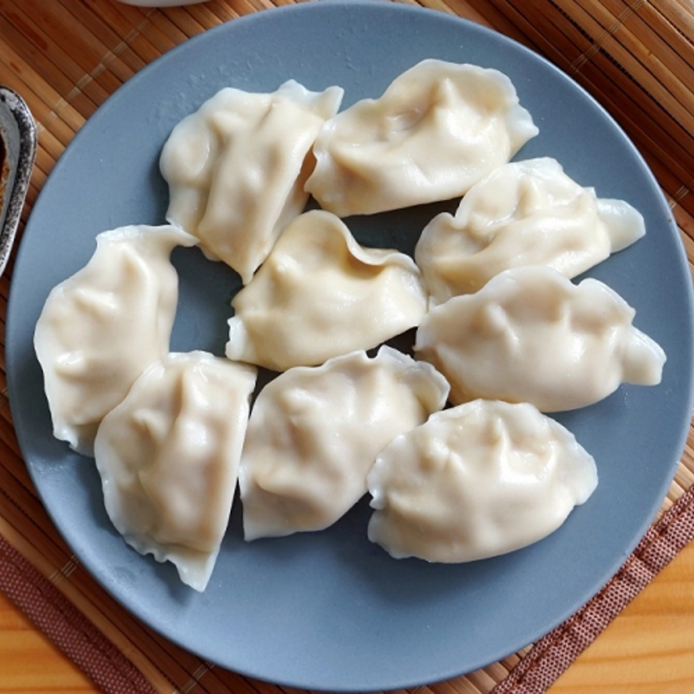 Máquina de empanadillas y productos rellenos