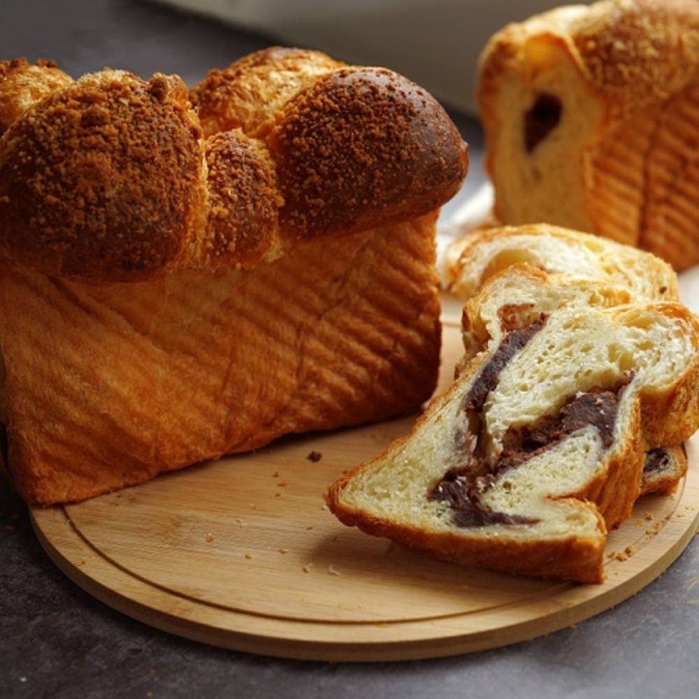 Máquina procesadora de pan relleno 